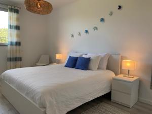 Postel nebo postele na pokoji v ubytování Albufeira Malpique Beach Apartment