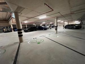 an empty parking garage with cars parked in it at Hotel Primavera Park in Benidorm