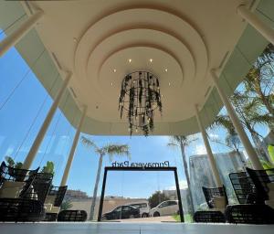 a view of a first approach sign in a car dealership at Hotel Primavera Park in Benidorm