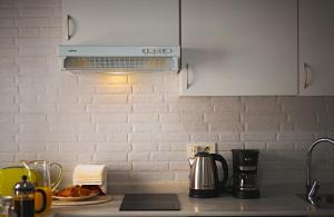 Kuchyňa alebo kuchynka v ubytovaní Apartamentos Infantes 28