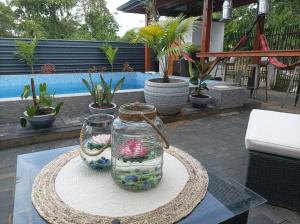 a glass jar sitting on top of a table at Tropical appartement in Paramaribo