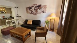 A seating area at TREBOL Apartamentos Benalmádena