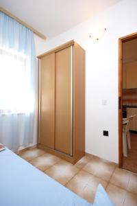 Posteľ alebo postele v izbe v ubytovaní Apartment Tri Zala 174d
