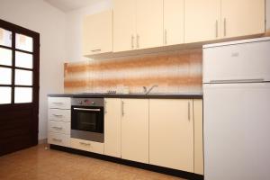 Kuchyňa alebo kuchynka v ubytovaní Apartment Tri Zala 174d