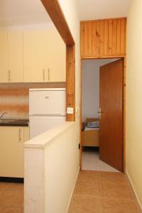 Kuchyňa alebo kuchynka v ubytovaní Apartment Tri Zala 174d + 17 fotografií