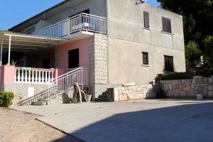 a building with a staircase in front of it at Apartment Prizba 219b in Prizba