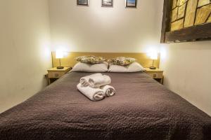 Posteľ alebo postele v izbe v ubytovaní Dolina Resort Zakopane