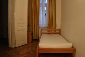 Postel nebo postele na pokoji v ubytování Suite Hotel 200m zum Prater