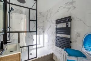 Łóżko lub łóżka w pokoju w obiekcie Appartement Armény - Welkeys