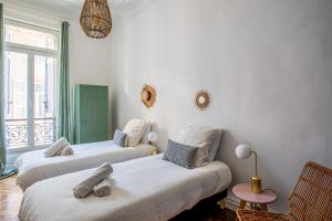 Кровать или кровати в номере Beautiful air conditioned apartment - Marseille - Welkeys