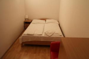 Postel nebo postele na pokoji v ubytování Suite Hotel 200m zum Prater