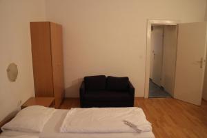 Postel nebo postele na pokoji v ubytování Suite Hotel 200m zum Prater