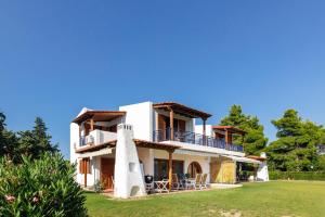 a villa with a view of the house at Luna Villa Private Beach in Nea Irakleia