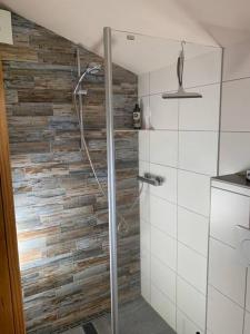 Koupelna v ubytování Bezauberndes Ferienhaus mitten in der Natur.