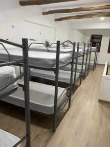 Posteľ alebo postele v izbe v ubytovaní Albergue y Gelateria il nonno