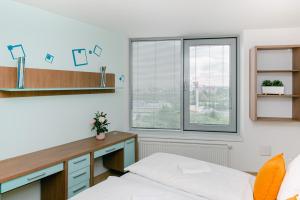Posteľ alebo postele v izbe v ubytovaní Slavic Spacious Apartment