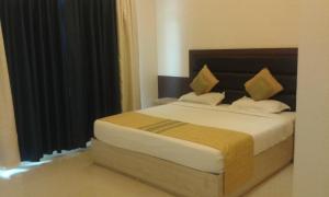 Postel nebo postele na pokoji v ubytování Hotel Shompen