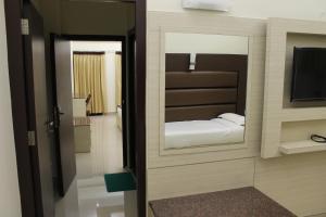 Postel nebo postele na pokoji v ubytování Hotel Shompen