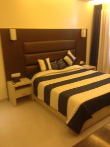 Postel nebo postele na pokoji v ubytování Hotel Shompen