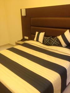 Postel nebo postele na pokoji v ubytování Hotel Shompen