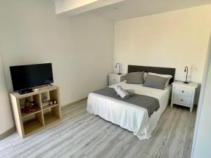 A bed or beds in a room at Brand new in the best location in Marbella