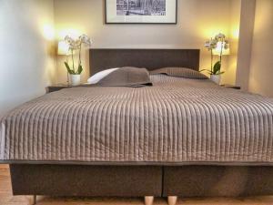Posteľ alebo postele v izbe v ubytovaní Tartaczna Deluxe Apartments Gdansk