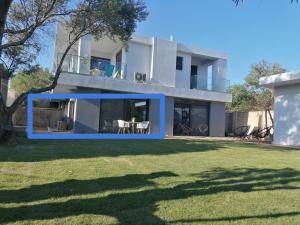 a house with a large yard in front of it at Greek Dream Homes Thimari in Sounio