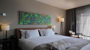Postel nebo postele na pokoji v ubytování Ladera Boutique Hotel