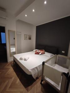 Tempat tidur dalam kamar di La Fenice MONTI