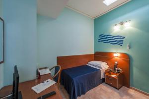 TV a/nebo společenská místnost v ubytování Millennium Gold Hotel