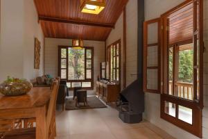 Uma área de estar em Embaúba Boutique Hotel
