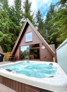 The swimming pool at or close to Bonnie Lodge-Lochside Location with Hot Tub