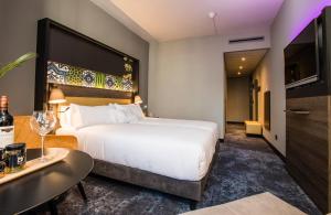 Postel nebo postele na pokoji v ubytování NYX Hotel Madrid by Leonardo Hotels
