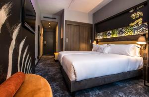 Postel nebo postele na pokoji v ubytování NYX Hotel Madrid by Leonardo Hotels