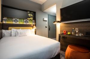 Postel nebo postele na pokoji v ubytování NYX Hotel Madrid by Leonardo Hotels