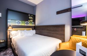 Postel nebo postele na pokoji v ubytování NYX Hotel Madrid by Leonardo Hotels
