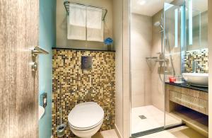 Ein Badezimmer in der Unterkunft Leonardo Hotel Munich City South