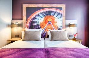 Ein Bett oder Betten in einem Zimmer der Unterkunft Leonardo Hotel Munich City South