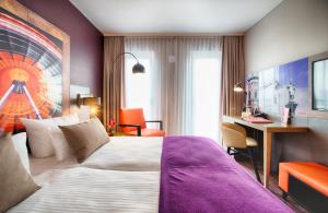 Ein Bett oder Betten in einem Zimmer der Unterkunft Leonardo Hotel Munich City South
