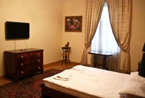 Voodi või voodid majutusasutuse British Club Lviv toas