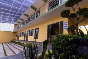 a school building with a blue ceiling at Hotel Boutique Mardeka in Orizaba