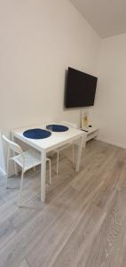 TV a/nebo společenská místnost v ubytování Apartments Ena