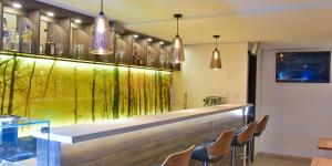 TV a/nebo společenská místnost v ubytování Casa Lua Hotel Spa