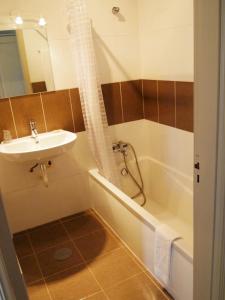 Koupelna v ubytování Hotel Areias Claras