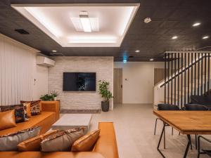 TV a/nebo společenská místnost v ubytování INFINITY HOTEL -jicchaku-