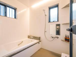 Koupelna v ubytování INFINITY HOTEL -jicchaku-