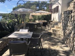 Patio nebo venkovní prostory v ubytování Apartments and rooms by the sea Mali Losinj (Losinj) - 10420
