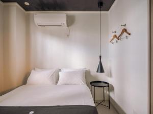 Postel nebo postele na pokoji v ubytování INFINITY HOTEL -jicchaku-