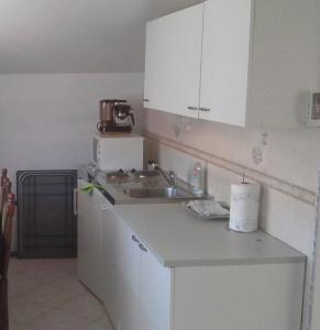 Kuchyň nebo kuchyňský kout v ubytování Apartments with a parking space Novigrad - 15227