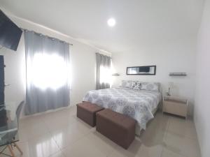 Ένα ή περισσότερα κρεβάτια σε δωμάτιο στο W's Hostel